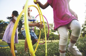 Kids Playing Hula Hoop